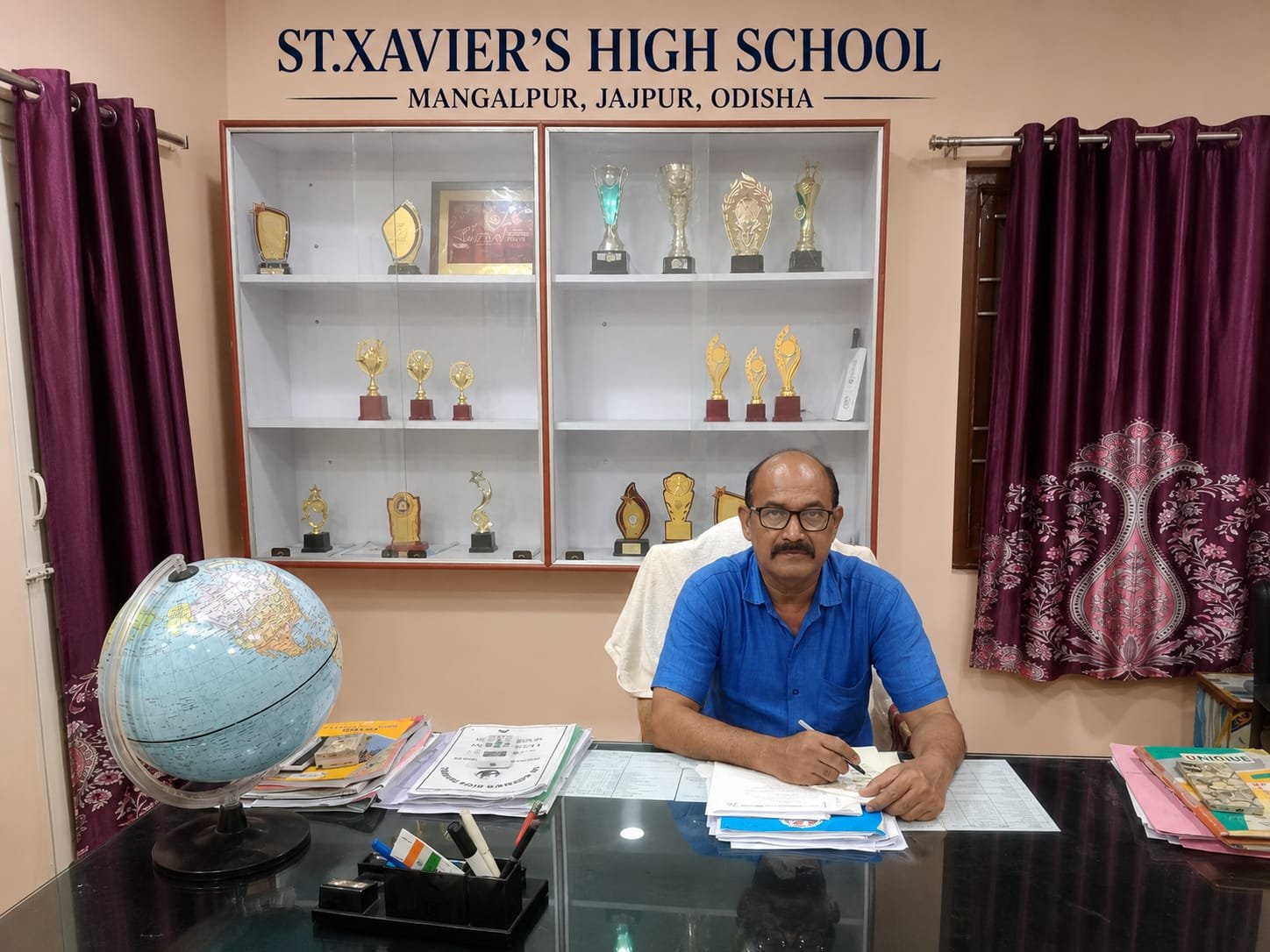 Mr. Gurucharan Behera, Principal