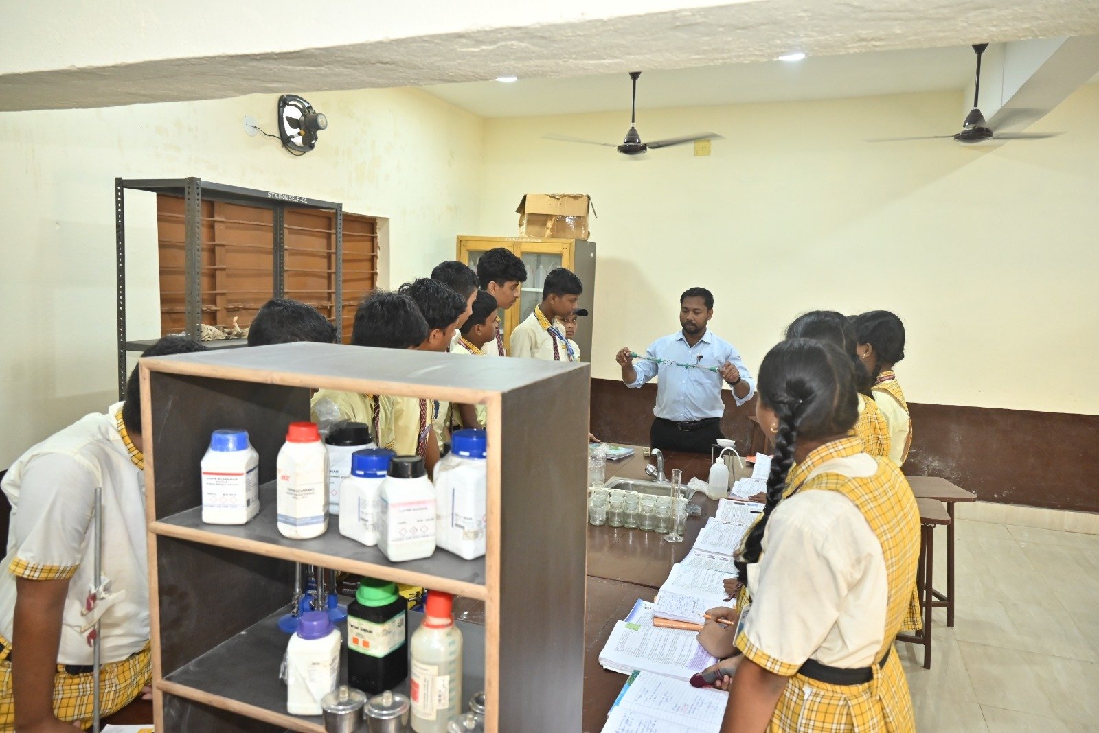 Students Performing Science Experiments